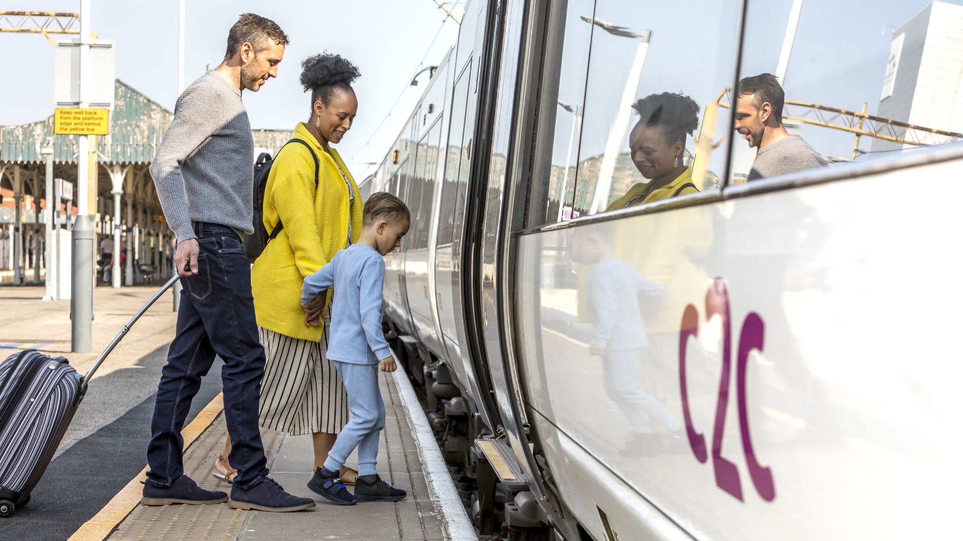  68a48215b3aa5 68a48215b3aa6family Boarding Train.jpg